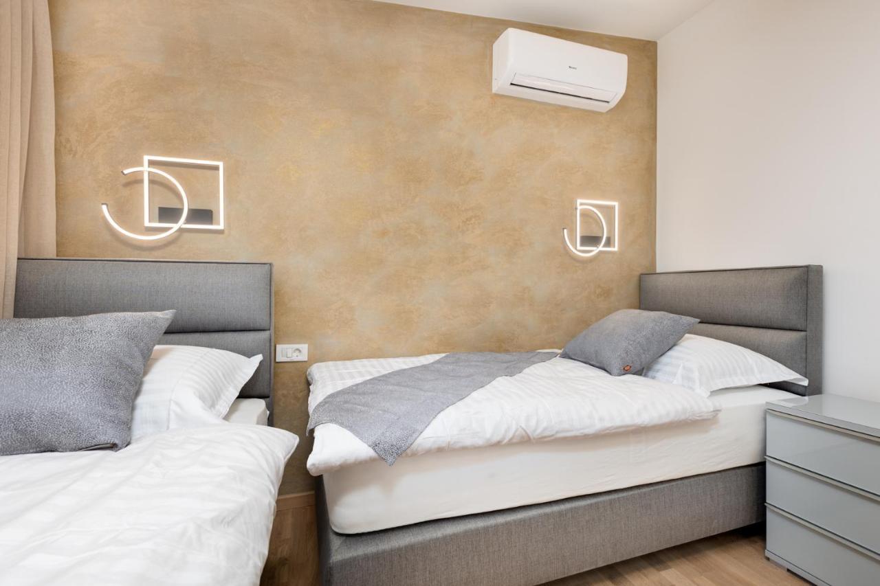 Apartment Muzini Malinska Bagian luar foto